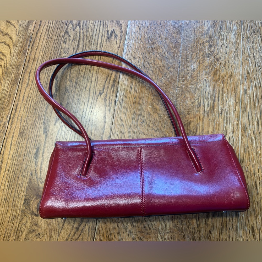 Unique Wilson Leather red leather handbag.